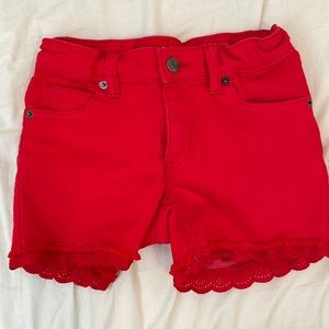 Cat & Jack red jean short size 7-8. And have a beautiful lace trim.